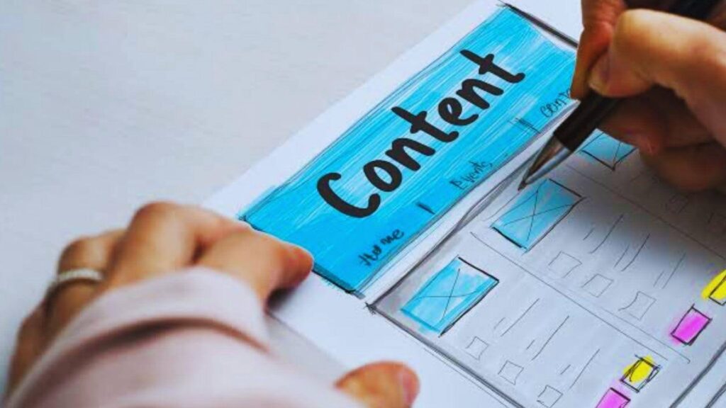 Hand sketching website content layout wireframe for SEO-friendly content planning and structure design 