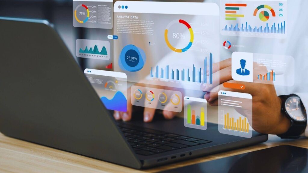 Business analyst reviewing data-driven content performance metrics on futuristic SEO dashboard over laptop